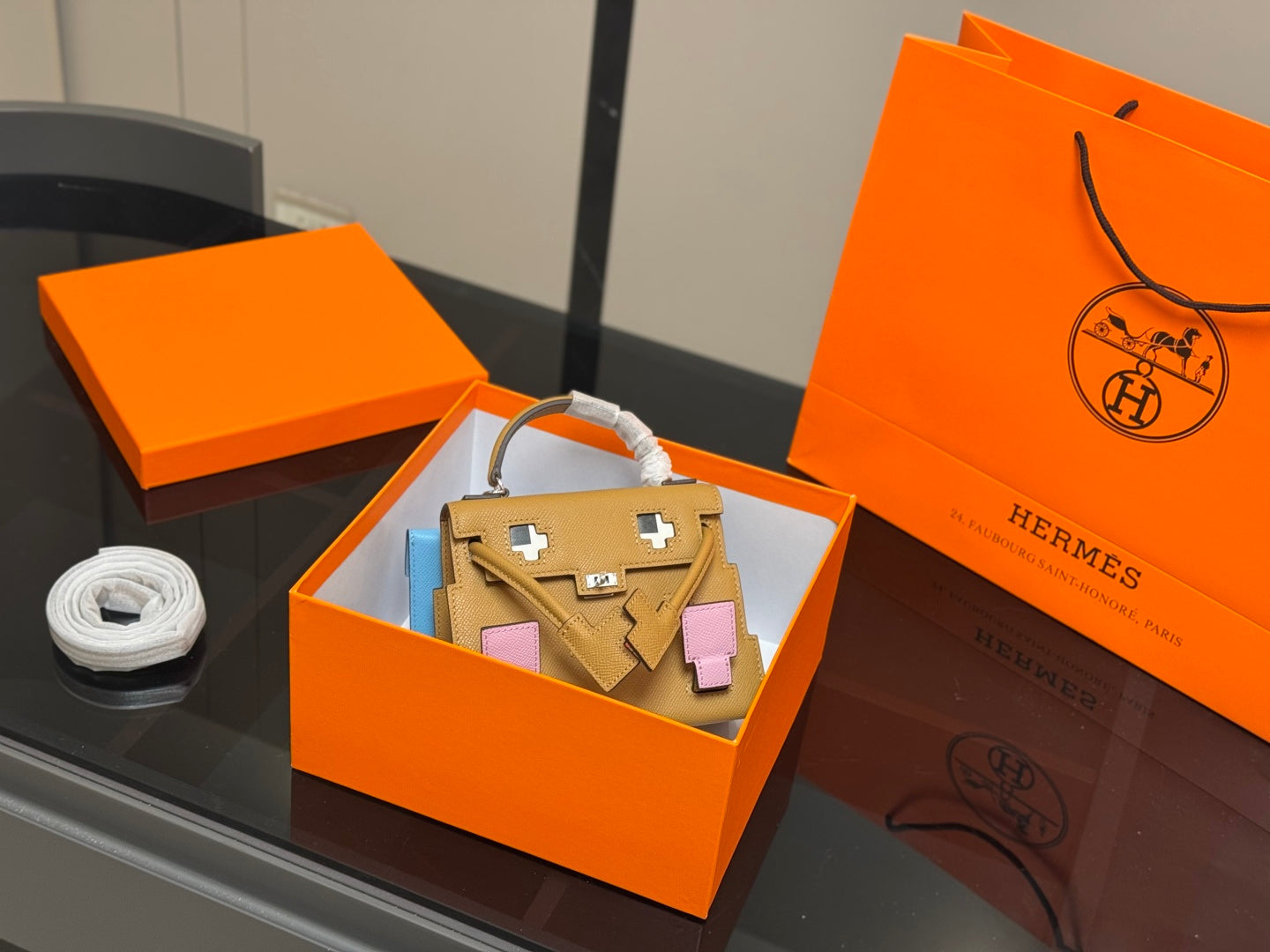 HermÃ¨s Kelly Doll Picto Mosaic - Biscuit & Mallow Purple Leather, 18cm