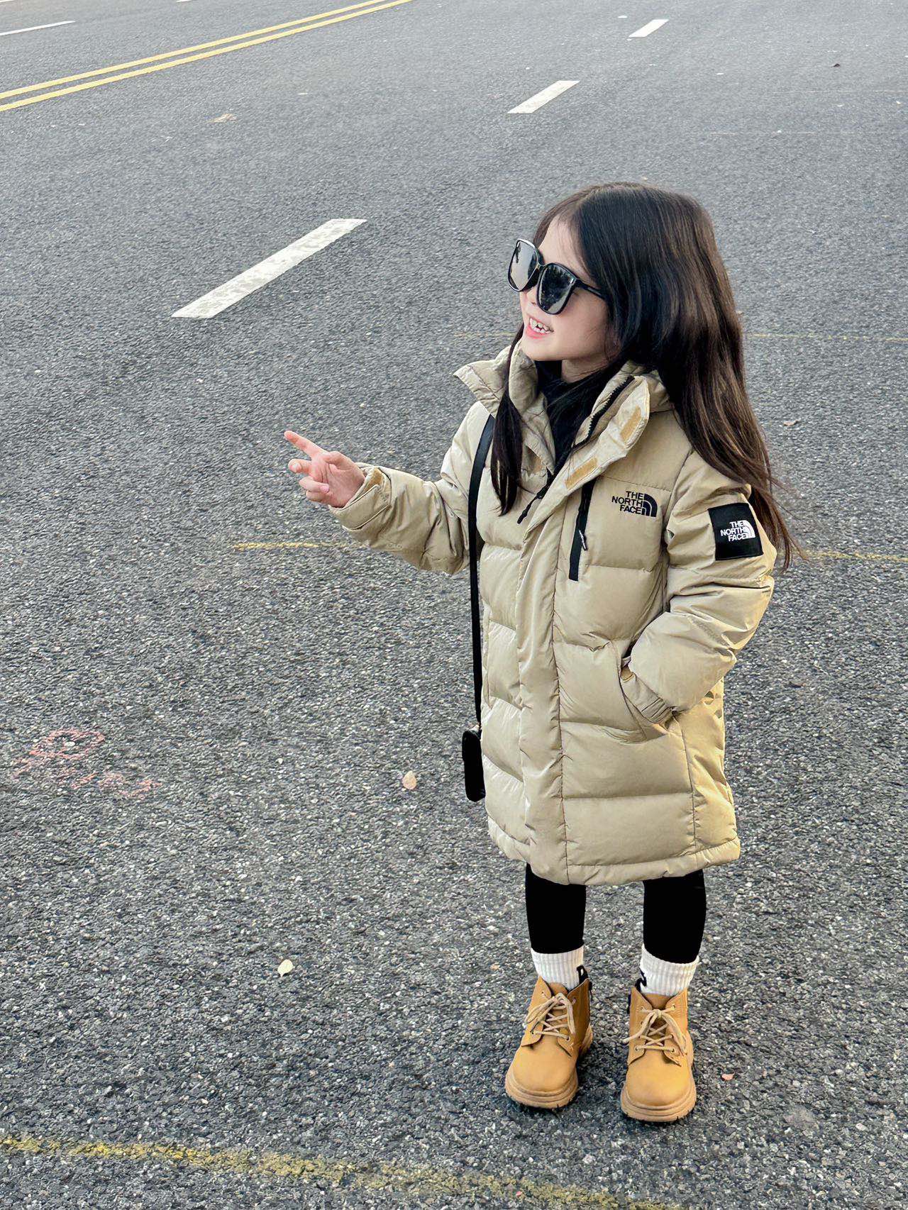 The North Face Children's Long Down Jacket - Stylish & Warm Winter Gear