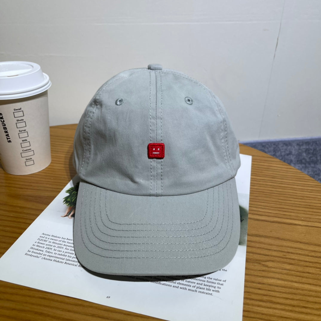 Acne Studios Smiley Face Baseball Cap - Stylish & Trendy Headwear