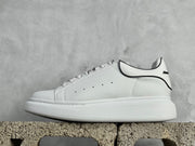 Alexander McQueen White Sneakers with Anti-Counterfeiting Chip | Luxury Calfskin Design