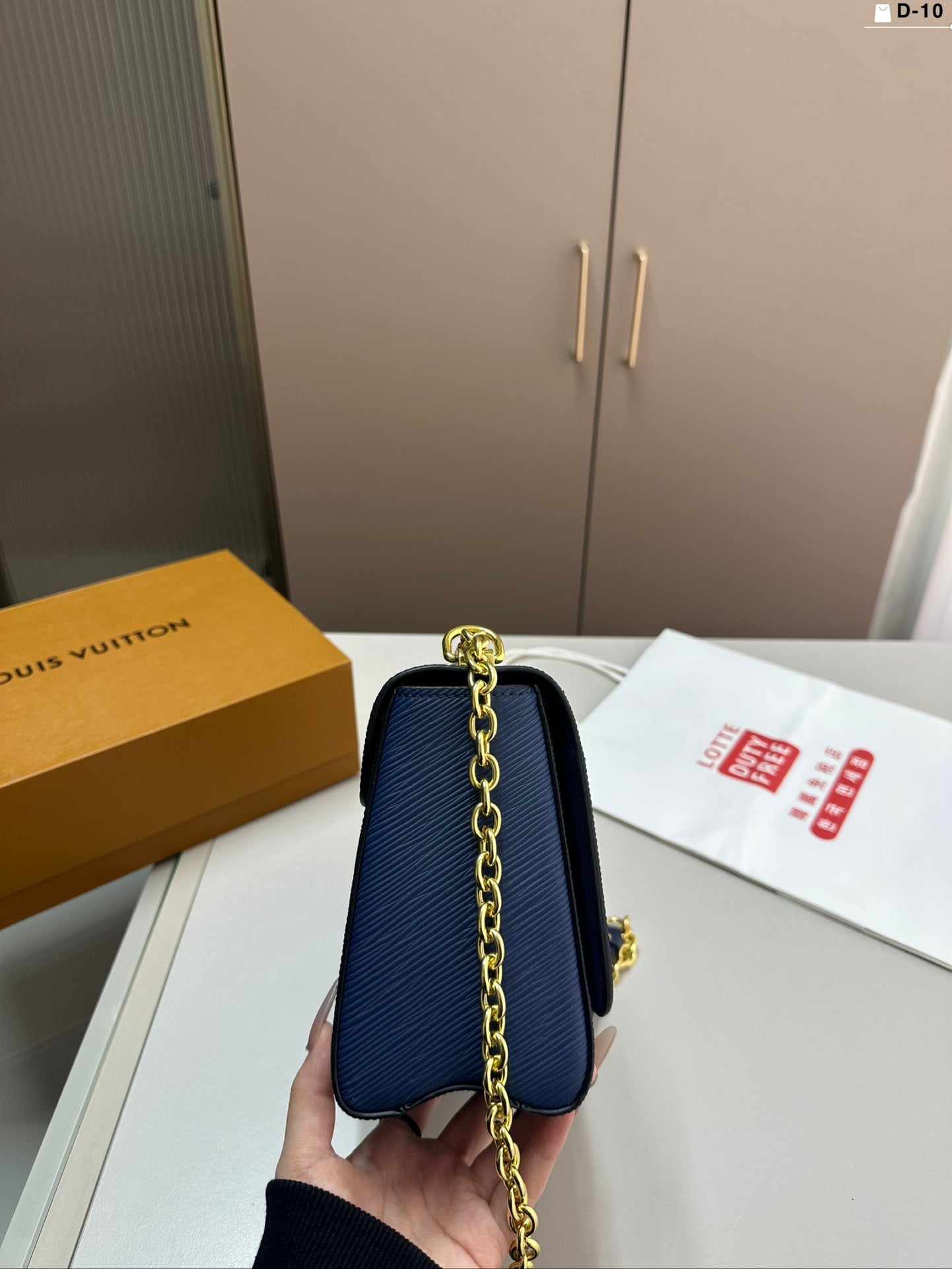 Louis Vuitton Twist Lock Bag - Stylish and Chic