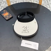 Chanel Women's Large Brim Straw Sun Hat â€“ UV Protection for Beach & Travel