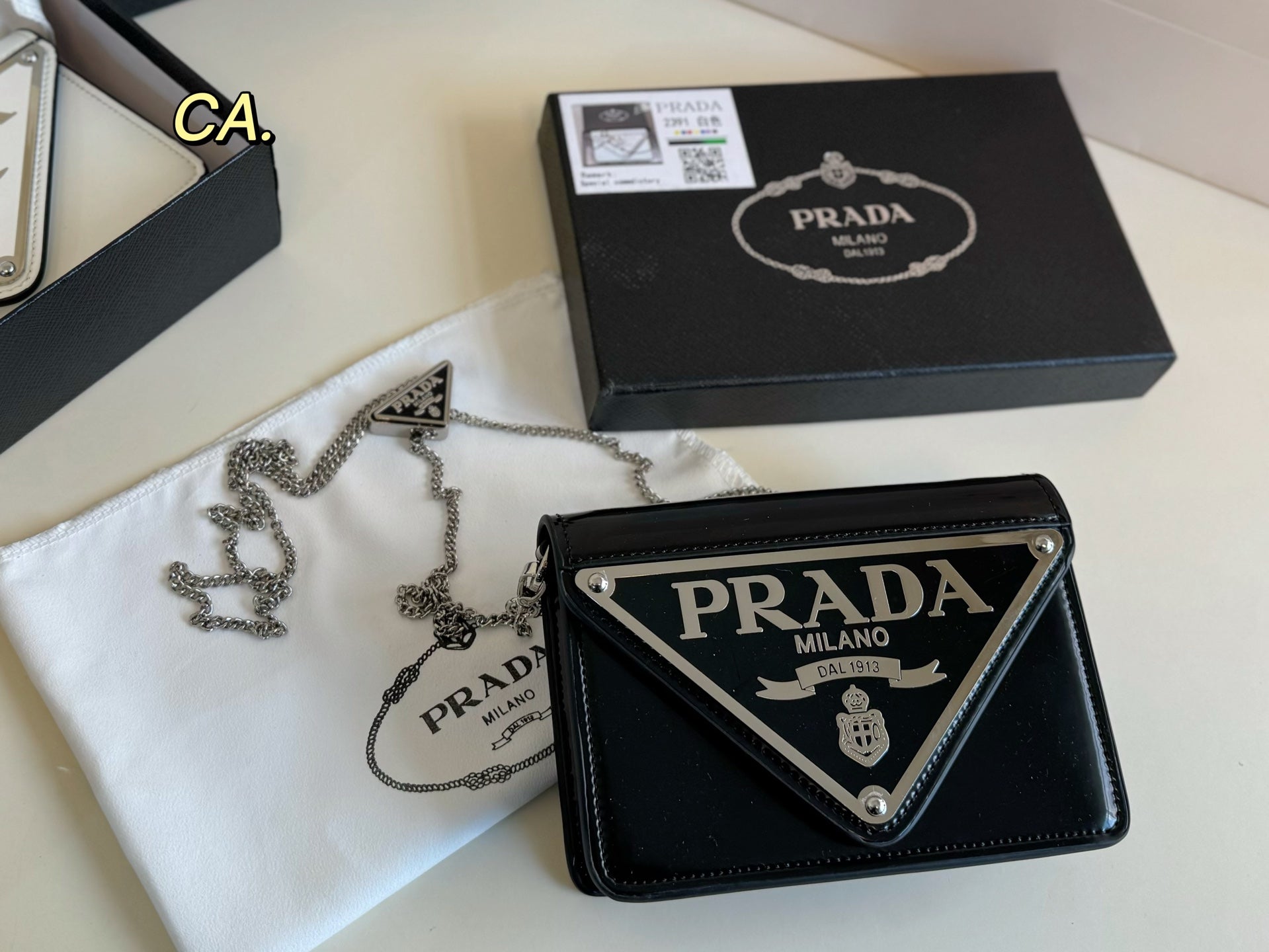 PRADA Triangle Logo Chain Bag - Iconic Style with Practical Appeal