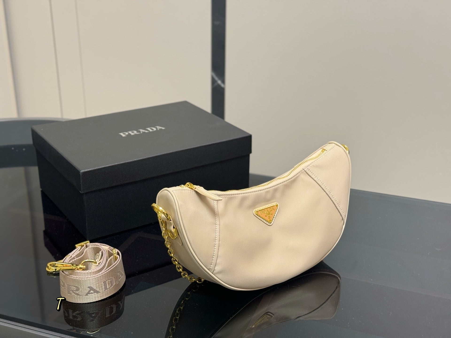 Prada Calf Horn Sling Bag - Elegant & Versatile Crescent Moon Design