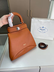 Elegant Prada Buckle Handbag - Versatile Luxury Design