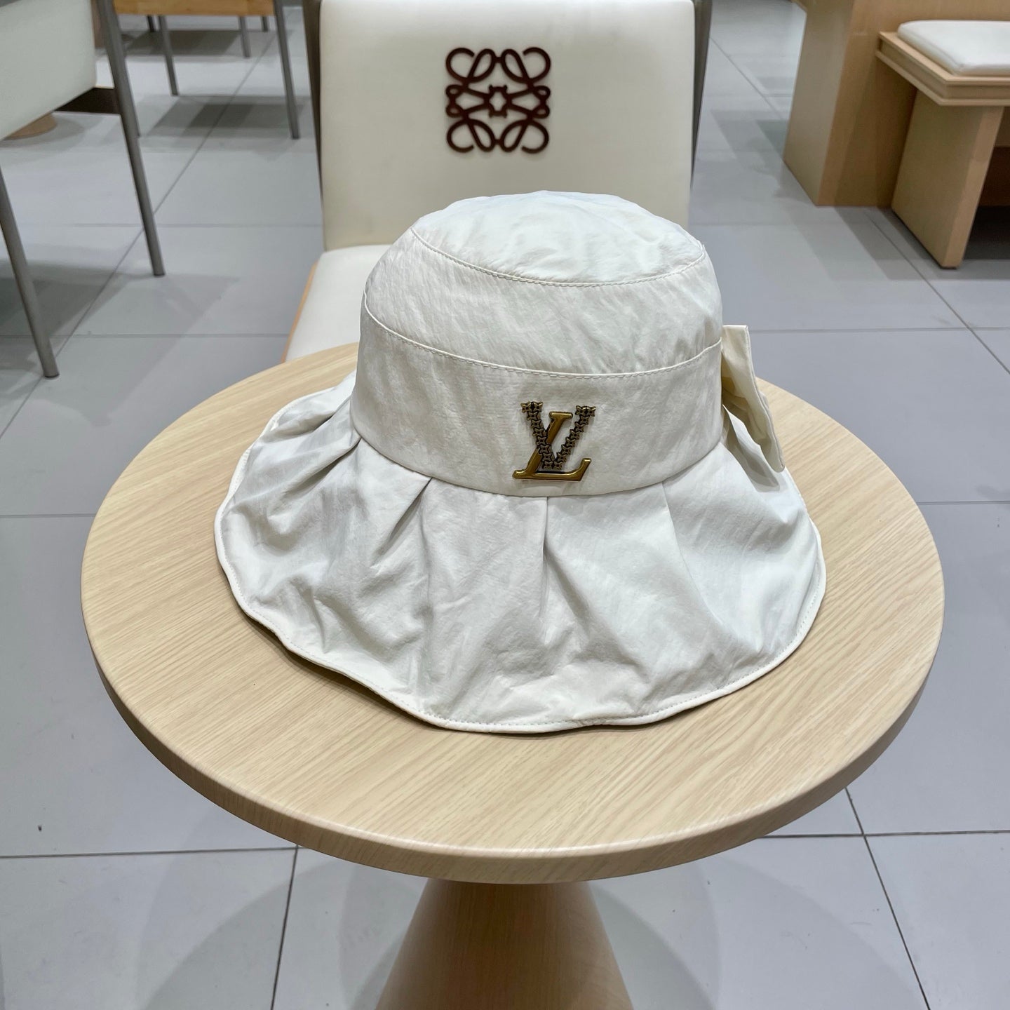 Louis Vuitton Bow Bucket Hat - Elegant Design, 57cm