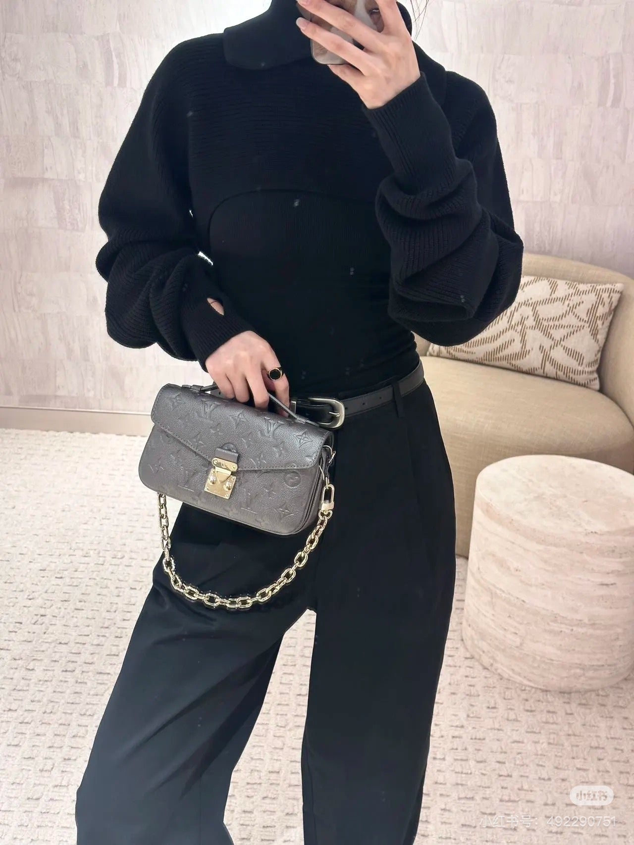 LV Embossed Postman Leather Bag