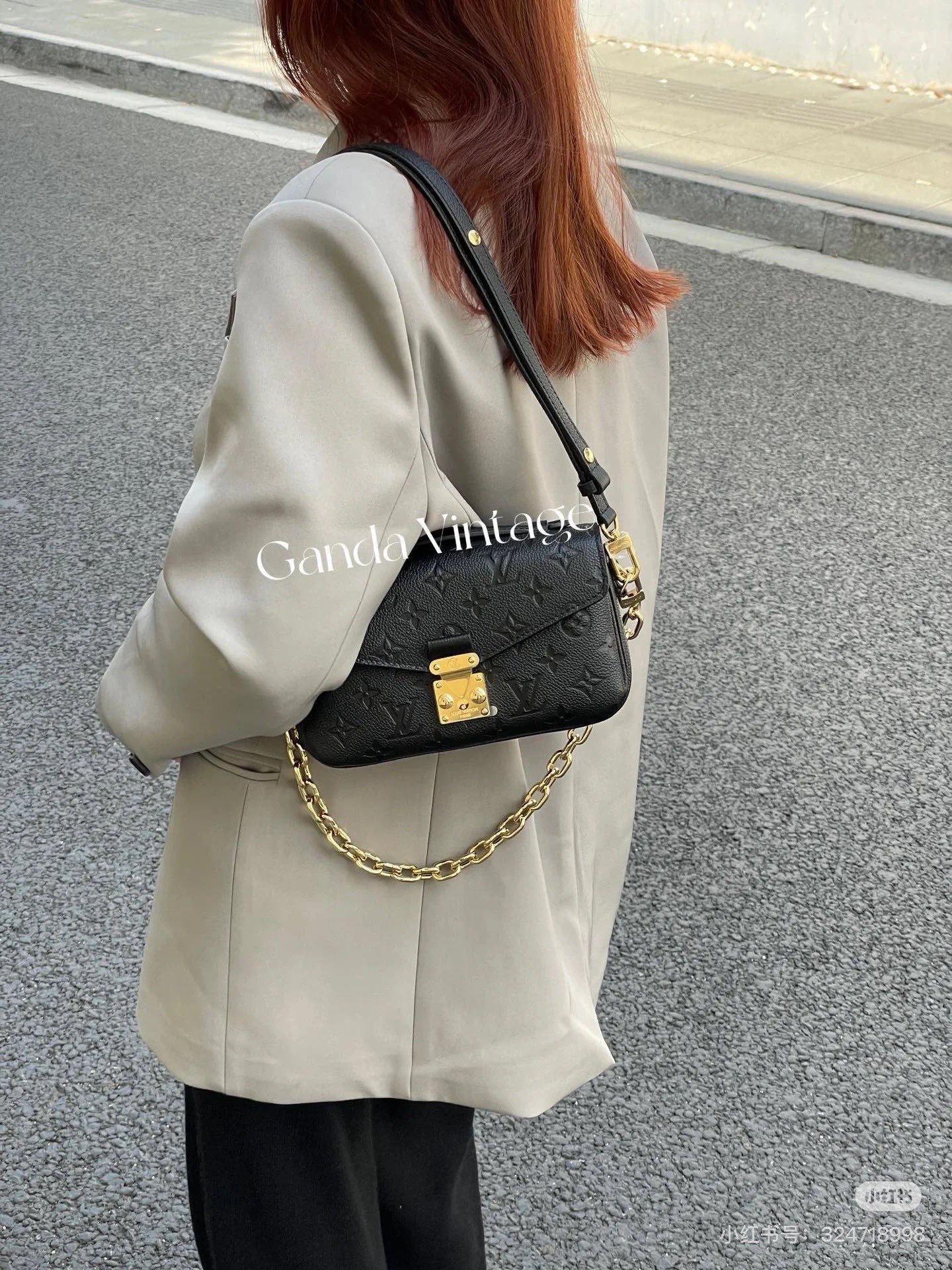 LV Embossed Postman Leather Bag