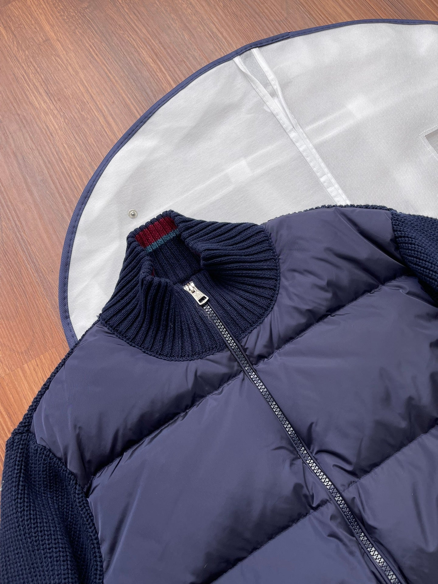 ** Stylish Moncler-Inspired Knitted Down Jacket with Stand Collar

**