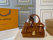 LV Louis Vuitton Madeleine BB Handbag - Embossed Leather & Suede