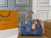 Louis Vuitton Distressed Denim Pillow Bag - Retro Chic