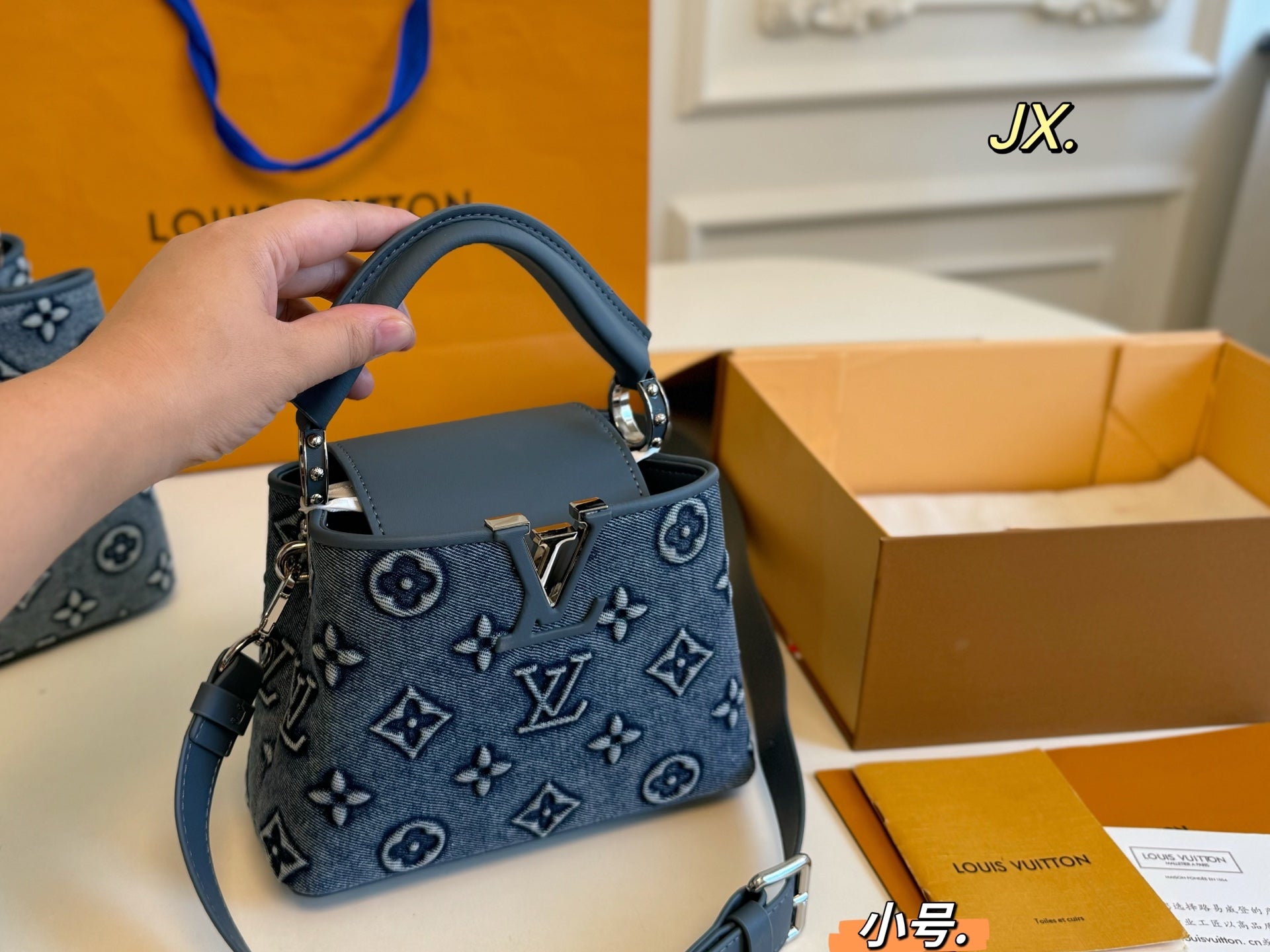 Louis Vuitton Denim Capucines Handbag - Luxurious Elegance