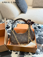 LV Catchy Small Handbag - Classic Monogram Design