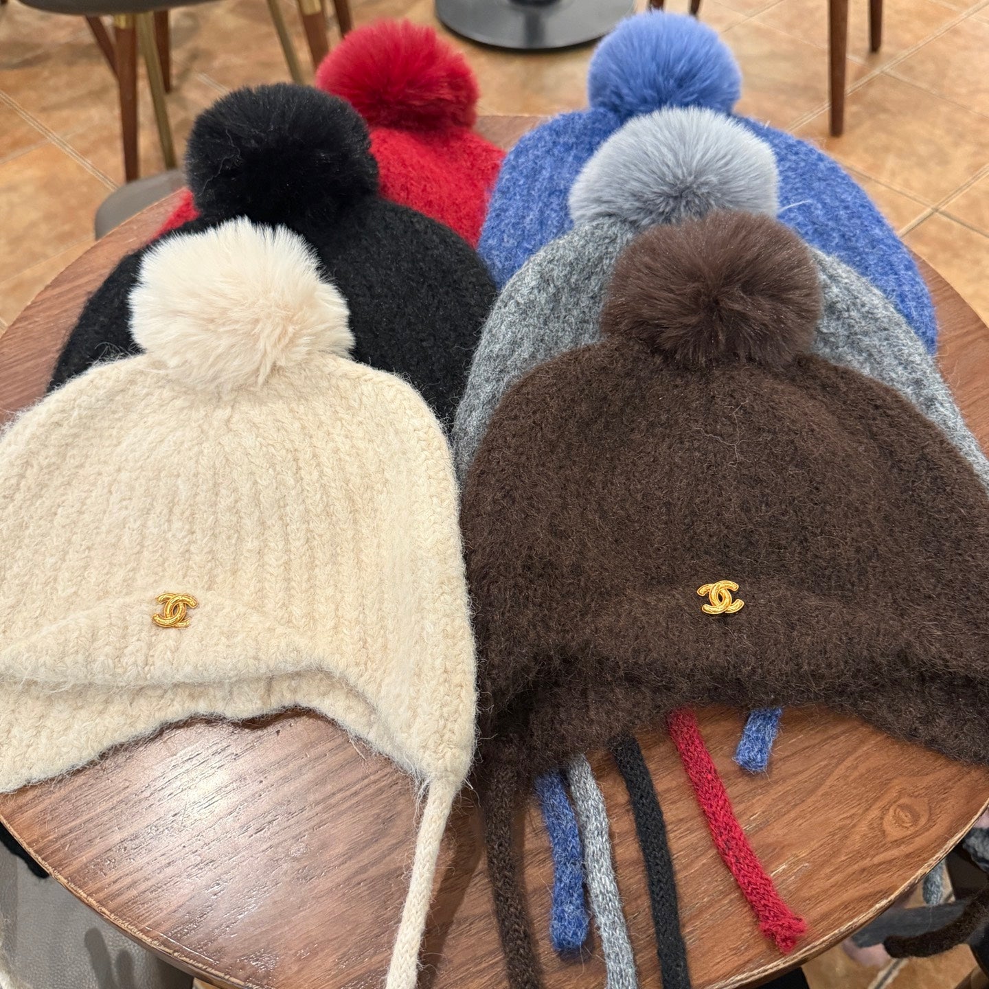 Chic Chanel Knitted Wool Ear Protection Hat with Fur Pom Pom