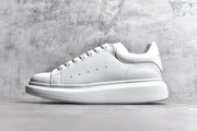 Alexander McQueen White Lace-Up Sneakers with Anti-Counterfeiting Chip