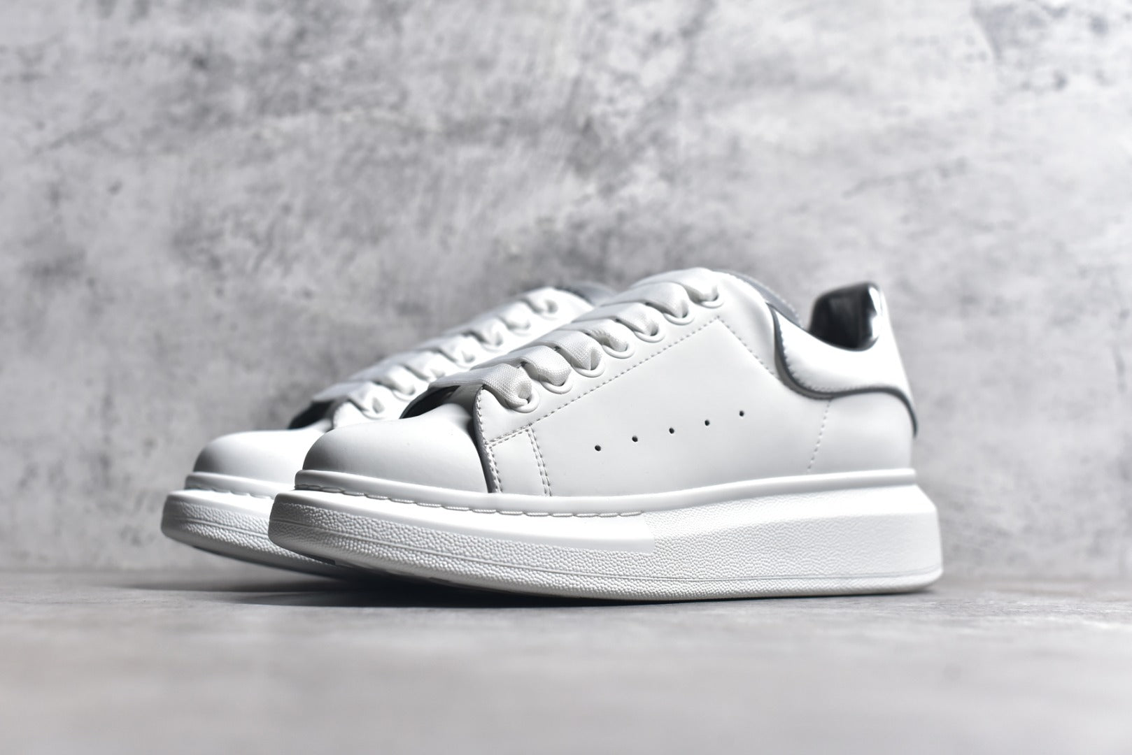Authentic Alexander McQueen White Lace-Up Sneakers with Anti-Counterfeit Technology