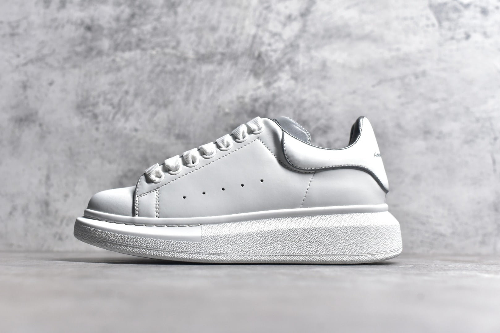 Alexander McQueen White Calfskin Lace-Up Sneakers with Anti-Counterfeiting Chip