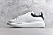 Alexander McQueen Authentic White Lace-Up Sneakers with Anti-Counterfeit Technology