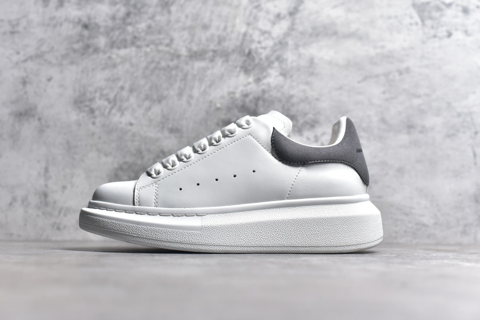 Alexander McQueen White Lace-Up Sneakers with Anti-Counterfeiting Technology