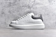 Alexander McQueen White Lace-Up Sneakers with Anti-Counterfeiting Technology
