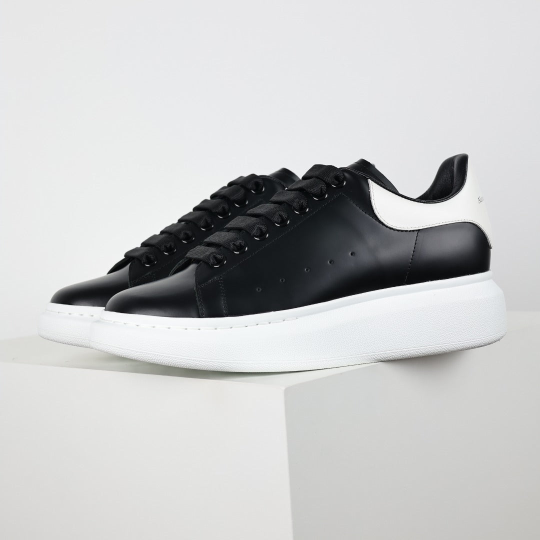 Alexander McQueen White Calfskin Lace-Up Sneakers with Black Accents