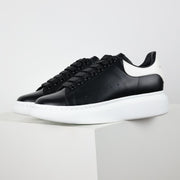 Alexander McQueen White Calfskin Lace-Up Sneakers with Black Accents