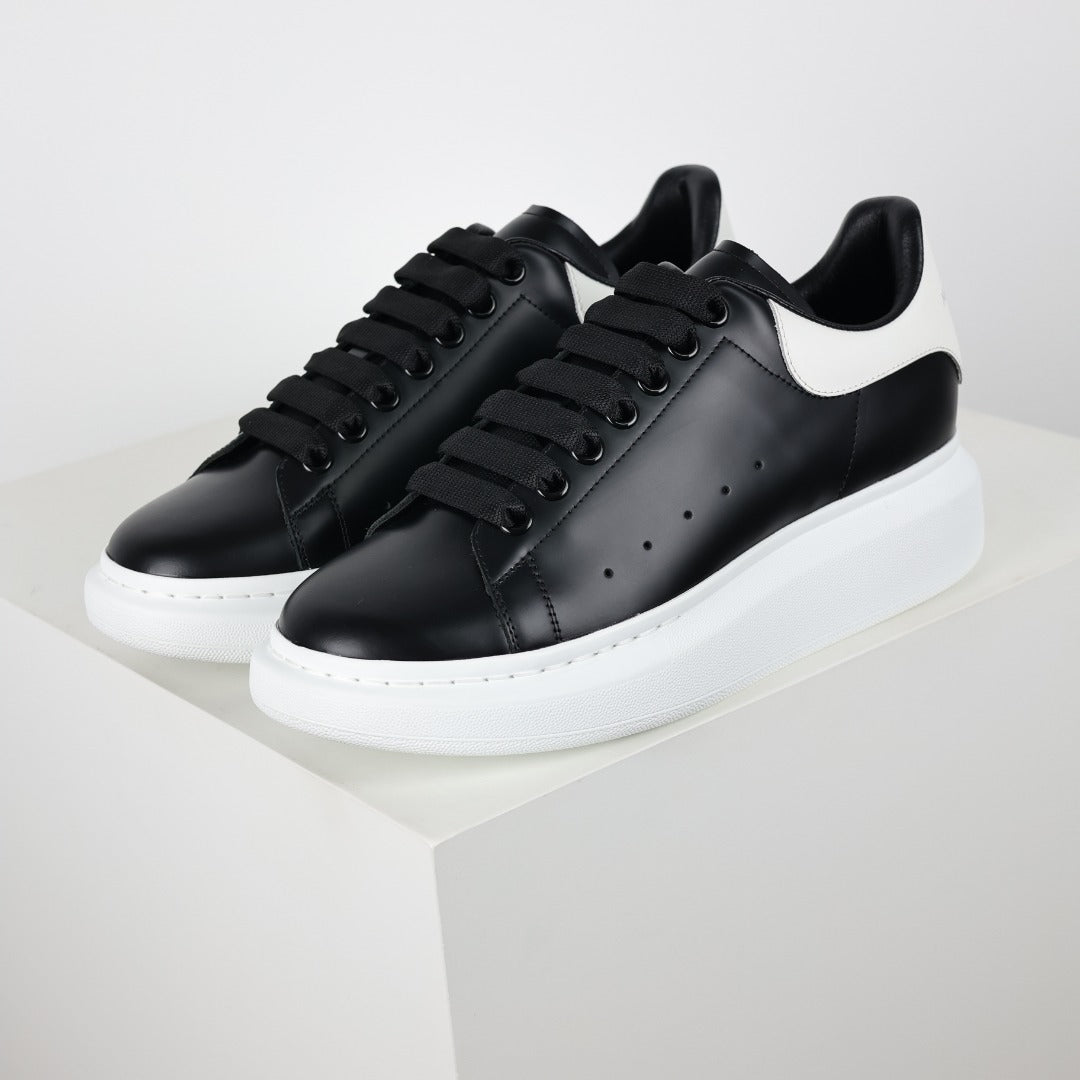 Alexander McQueen White Calfskin Lace-Up Sneakers with Black Accents
