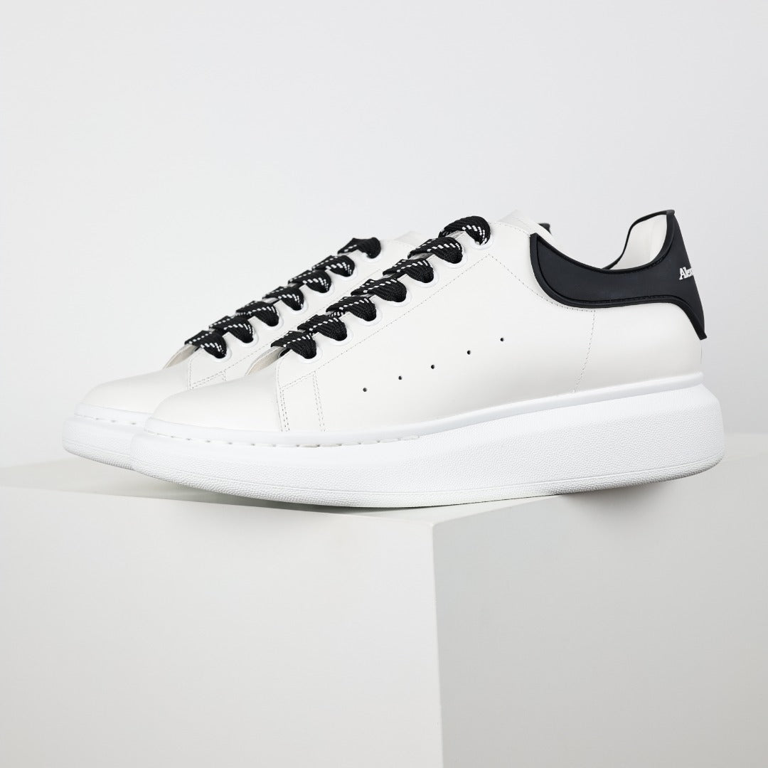 ** Premium Alexander McQueen White Calfskin Sneakers

**
